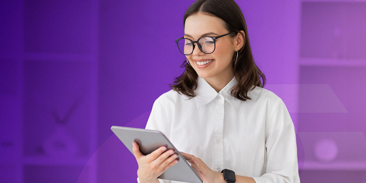 woman holding tablet